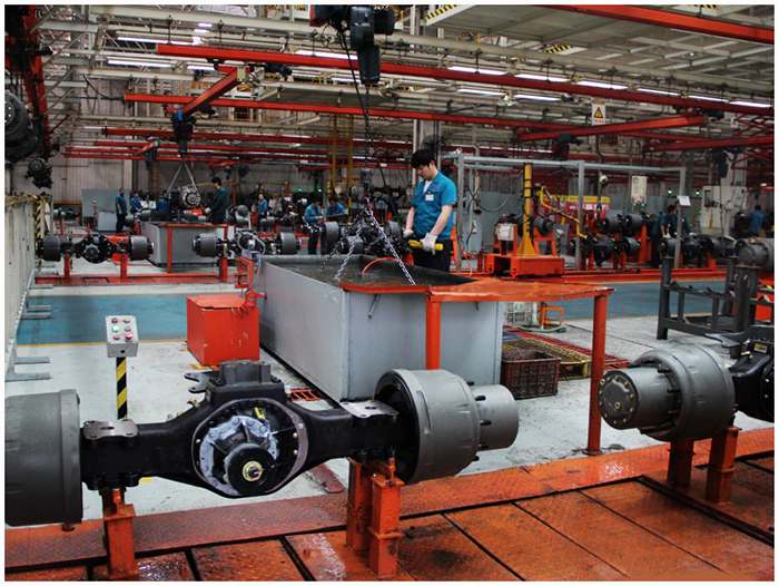 Truck axle assemblies in a manufacturing facility